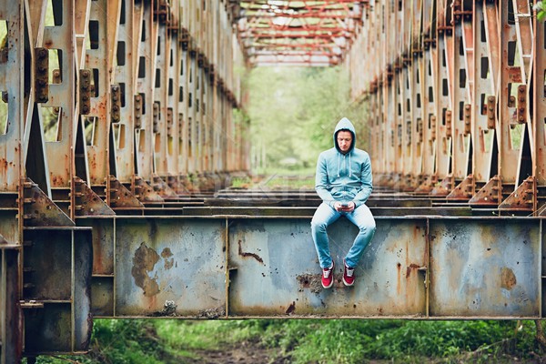 Sad man on the abandoned bridge  Stock photo © Chalabala