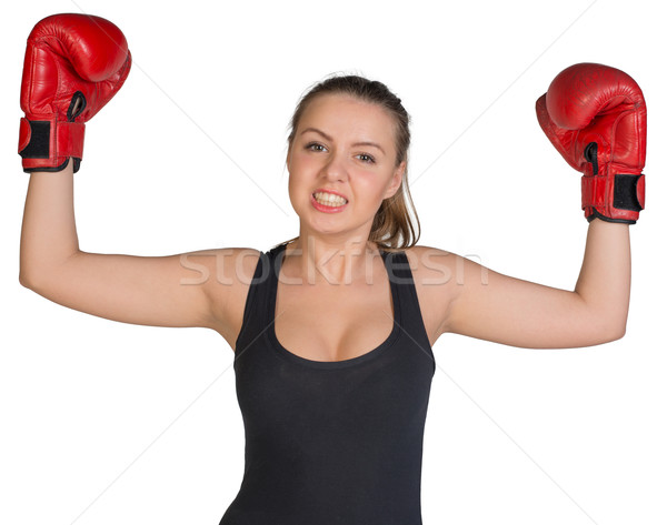 Stock photo: Woman in boxing gloves posing with her arms up