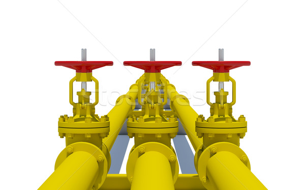 Three yellow pipes with valves Stock photo © cherezoff