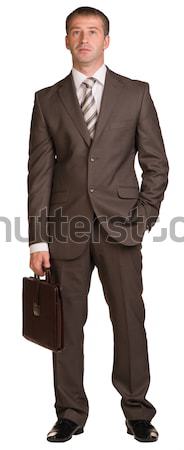 Stock photo: Businessman holding hand up in front of him