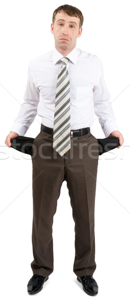 Businessman turned out his pockets Stock photo © cherezoff