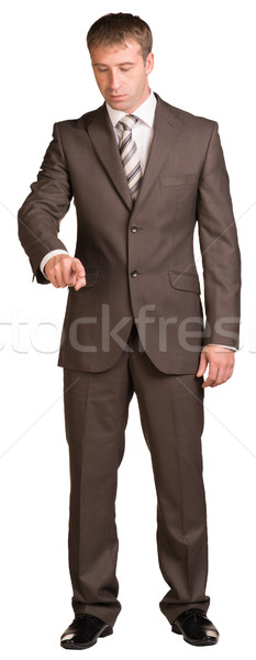 Stock photo: Businessman holding hand up in front of him