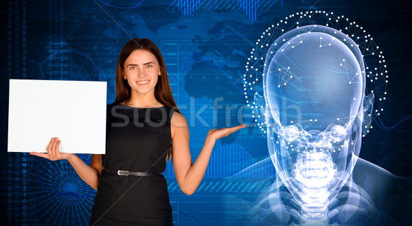 Businesswoman with x-ray image of head Stock photo © cherezoff