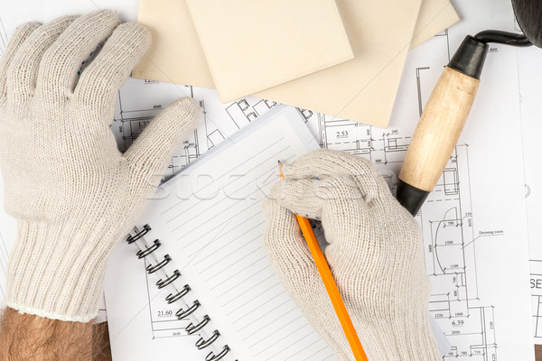 Humans hand writing in pad Stock photo © cherezoff