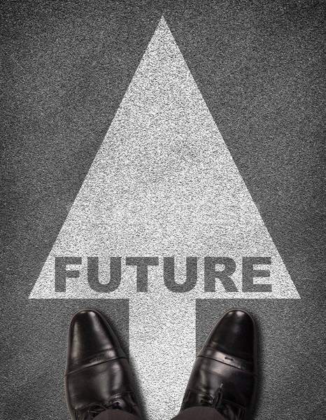 Shoes standing on asphalt road with arrow and word future Stock photo © cherezoff