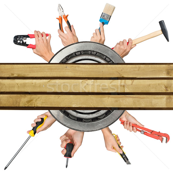 Humans hands holding tools on white Stock photo © cherezoff