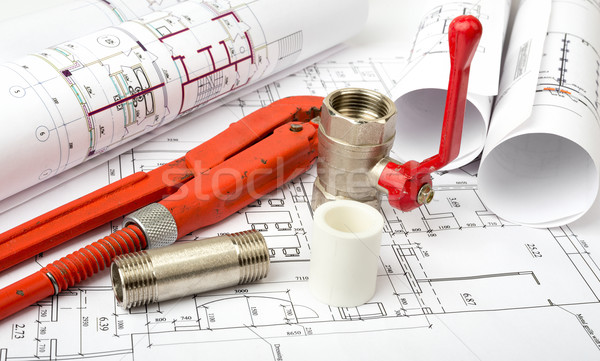 Architecture plan and rolls of blueprints Stock photo © cherezoff