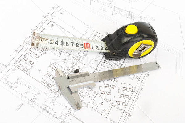 Tape measure with beam-compass, side view Stock photo © cherezoff