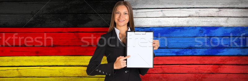 Geschäftsfrau halten Papier Deutschland Fahnen Stock foto © cherezoff