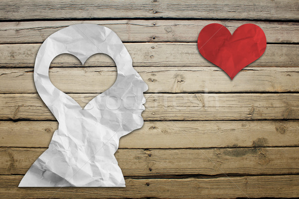 Paper humans head with heart Stock photo © cherezoff