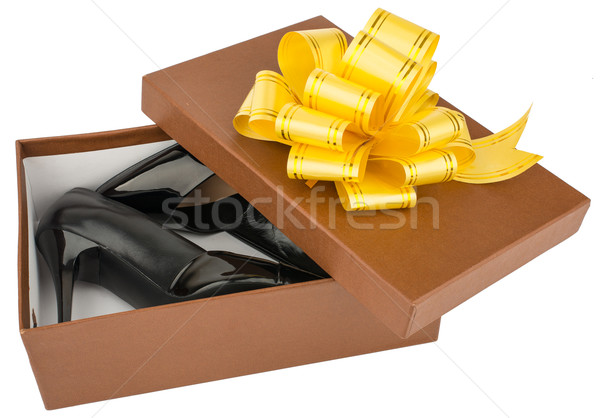 Female shoes on box with ribbon Stock photo © cherezoff