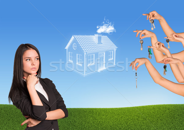Businesswoman with brooding eyes Stock photo © cherezoff