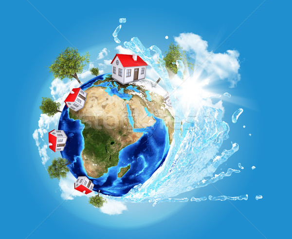 Earth model with ocean wave and houses Stock photo © cherezoff