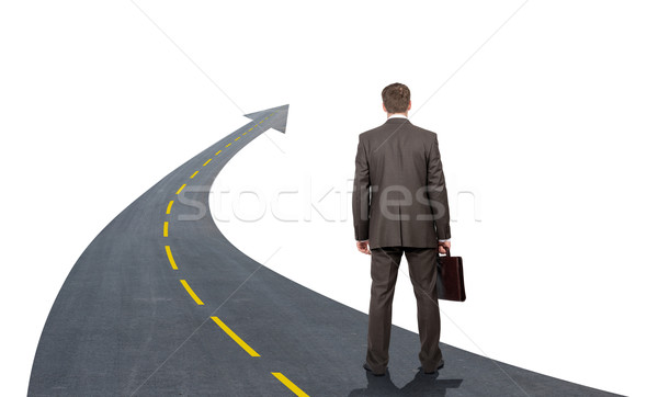 Businessman walking road going up llike arrow Stock photo © cherezoff