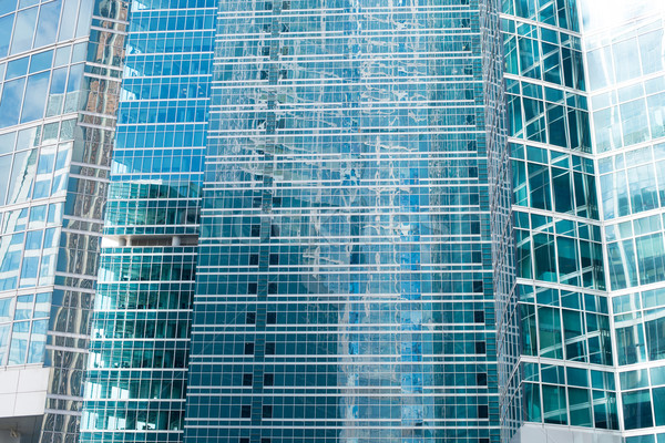 Toronyház épületek tiszta égbolt oldalnézet kék ég Stock fotó © cherezoff