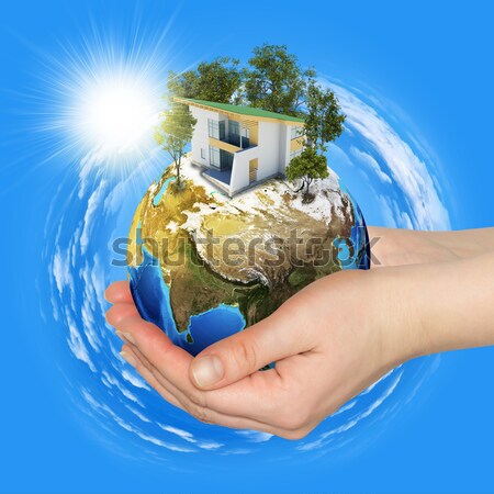 Stock photo: Earth planet image with buildings on surface