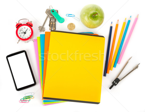 Copybooks with smartphone and office stuff Stock photo © cherezoff