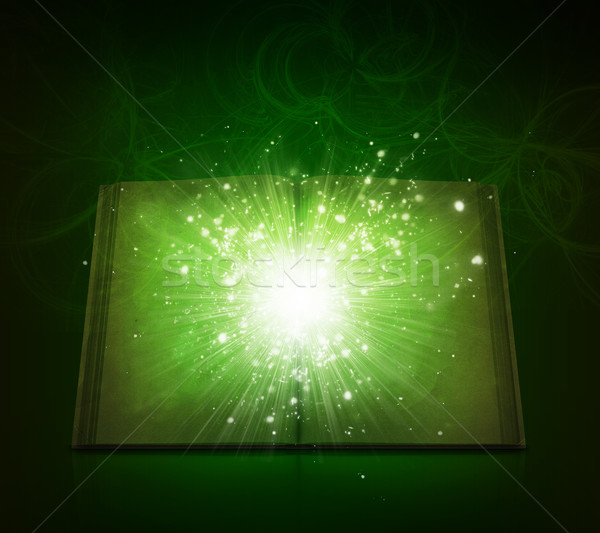 Vecchio libro aperto magia luce cadere stelle Foto d'archivio © cherezoff