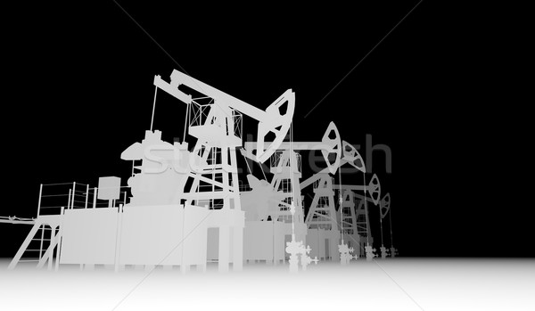 Gray silhuettes of oil pump-jacks Stock photo © cherezoff