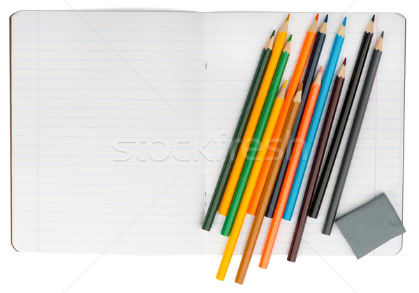 Open notebook set pastelli eraser isolato Foto d'archivio © cherezoff