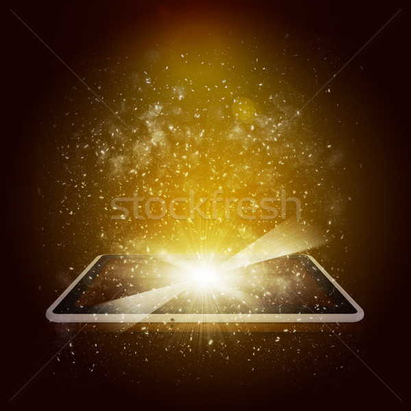 Old open book with magic light and falling stars Stock photo © cherezoff