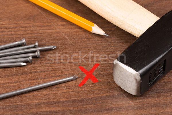 Stock photo: Hammer and nails on table