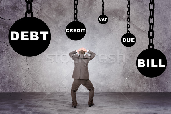 Businessman looking up on words Stock photo © cherezoff