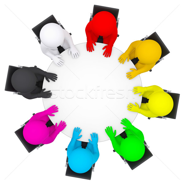 Multicolored people sitting at a round table Stock photo © cherezoff