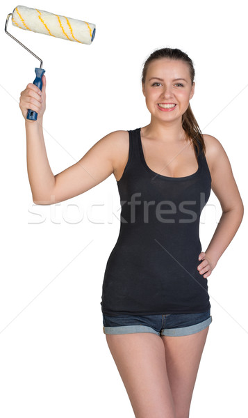 Stock photo: Woman holding paint roller