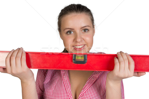 Woman holding builders level Stock photo © cherezoff