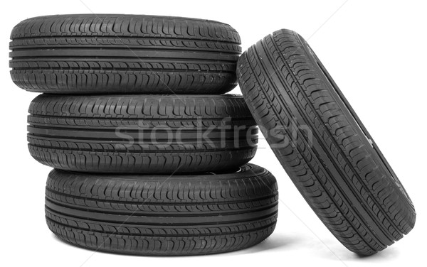 Stack of four wheel new black tyres Stock photo © cherezoff