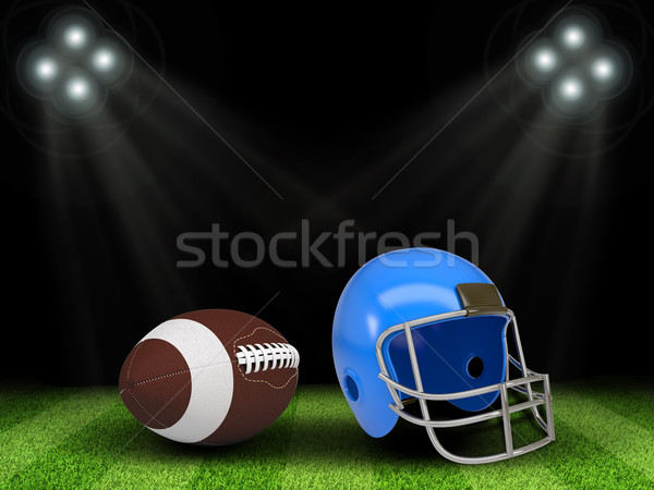 Football ball and helmet in the middle of field Stock photo © cherezoff