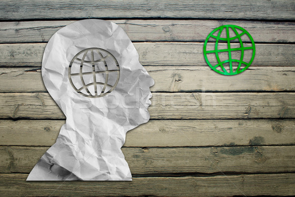 Paper humans head with globe symbol Stock photo © cherezoff