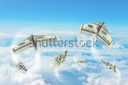 Paper airplanes made of hundred dollar bills Stock photo © cherezoff