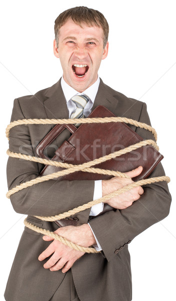 Businessman tied with rope screaming Stock photo © cherezoff