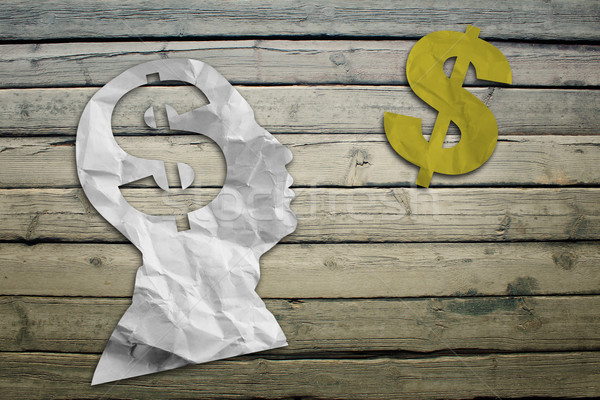 Paper humans head with dollar symbol Stock photo © cherezoff