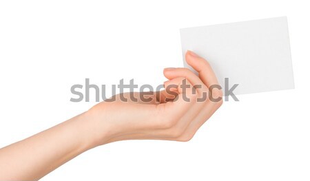 Womans hand with horizontal small empty card Stock photo © cherezoff