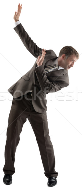 Isolated business man dodge something Stock photo © cherezoff
