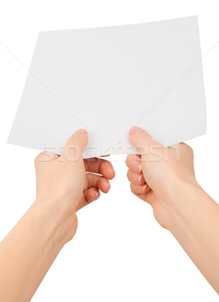 Womans hands giving empty paper Stock photo © cherezoff
