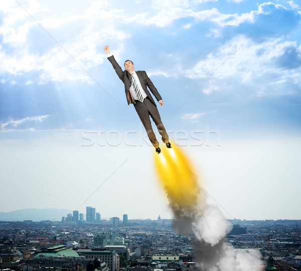 Stock photo: Businessman like superman flying