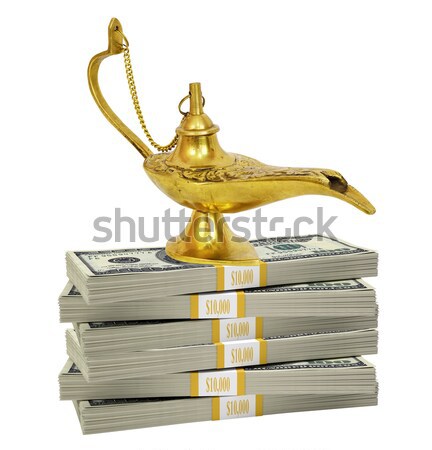 Bundle of dollars and magic lamp of Aladdin Stock photo © cherezoff