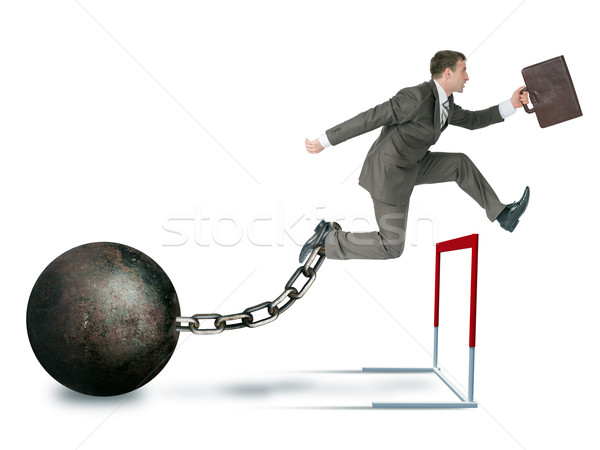 Businessman hoppig over barrier Stock photo © cherezoff
