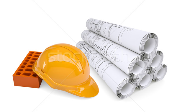 Scrolls of architectural drawings and building brick with helmet Stock photo © cherezoff