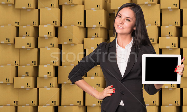 Stockfoto: Glimlachend · jonge · vrouw · tablet · naar · camera · abstract