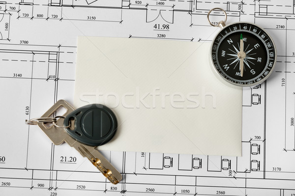 Compass with blueprints and key Stock photo © cherezoff