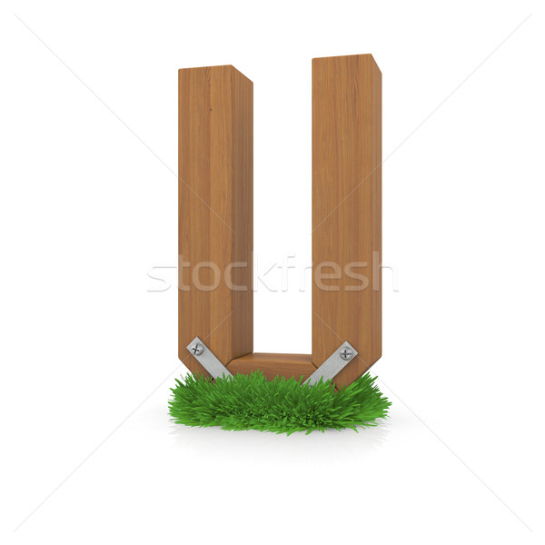 Wooden letter U in the grass Stock photo © cherezoff