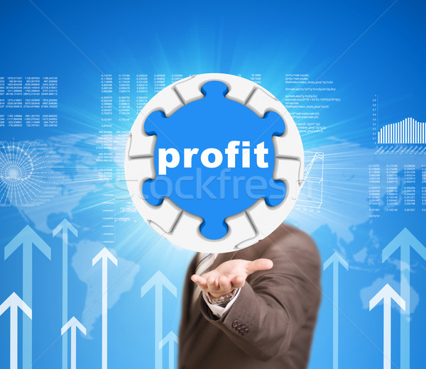Stock photo: Business man hold puzzle sphere with profit label