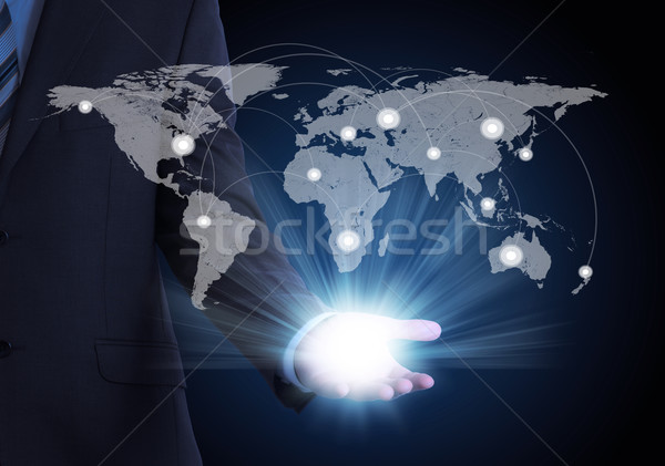 Man in suit, world map and contacts Stock photo © cherezoff