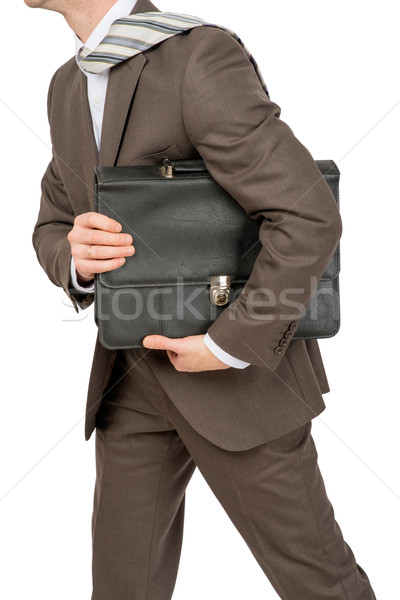 Businessman holding suitcase Stock photo © cherezoff