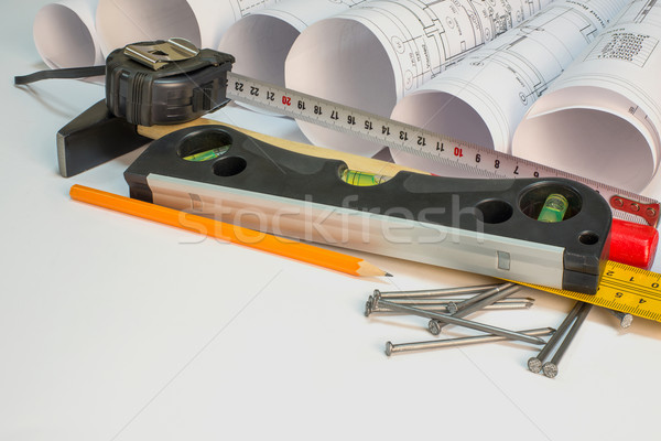 Drawing rolls and construction tools composition Stock photo © cherezoff